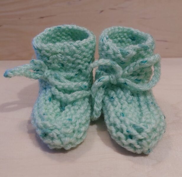 Knitted baby booties (acrylic; handmade)