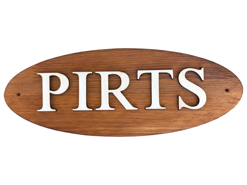 Wooden sauna sign with inscription in Latvian "Pirts" (linden)